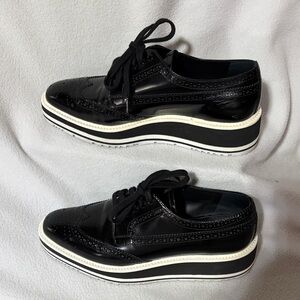 Prada Black and White Sole Brogues